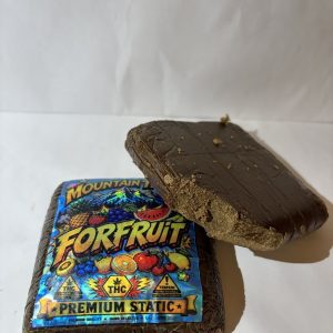 Buy Mountain Terps Static online showing premium static sift hash with golden trichomes and rich terpene profile.